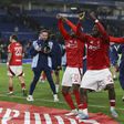 Ola Aina celebrates with Nottingham Forest teammates during the  (Credit: Imago)