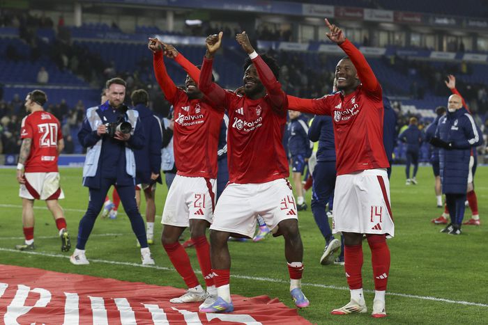 Ola Aina celebrates with Nottingham Forest teammates during the  (Credit: Imago)