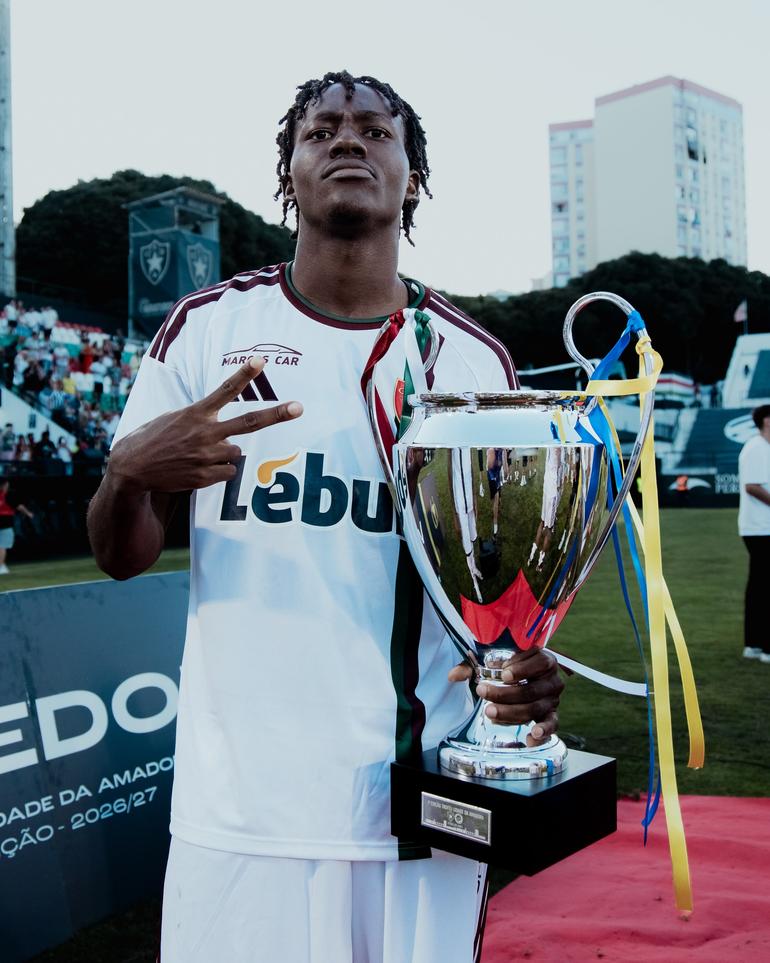 Al-Nassr slayer Abraham Marcus with the trophy.