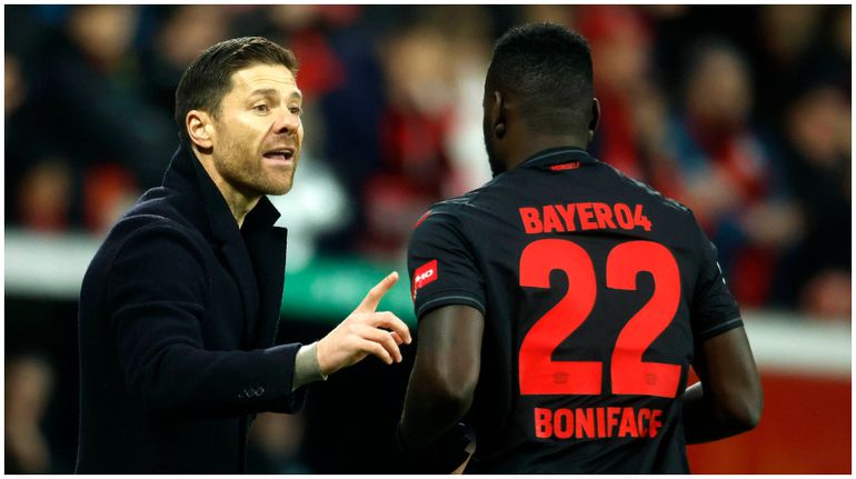 Bayer boss, Xabi Alonso, passes some instructions for Victor Boniface.