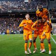 Real Madrid players celebrate a goal (Credit: Imago)