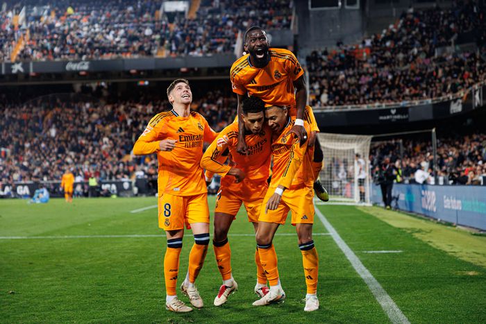Real Madrid players celebrate a goal (Credit: Imago)