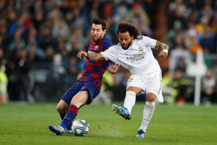 L-R Lionel Messi Barcelona, Marcelo Real, MARCH 1, 2020 - Football Soccer : Spanish La Liga Santander match between Real Madrid CF 2-0 FC Barcelona, Barca at the Santiago Bernabeu Stadium in Madrid, Spain. || Image credit: Imago