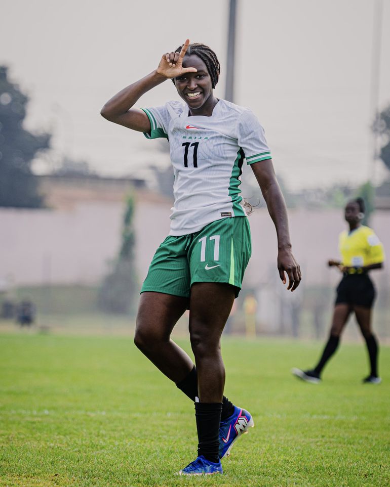 Babajide celebrates her goal.