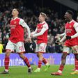 William Saliba (12) of Arsenal, Emile Smith Rowe (10), Eddie Nketiah (14) and Martin Odegaard (8) celebrate winning the Premier League match between Tottenham Hotspur and Arsenal at Tottenham Hotspur Stadium.