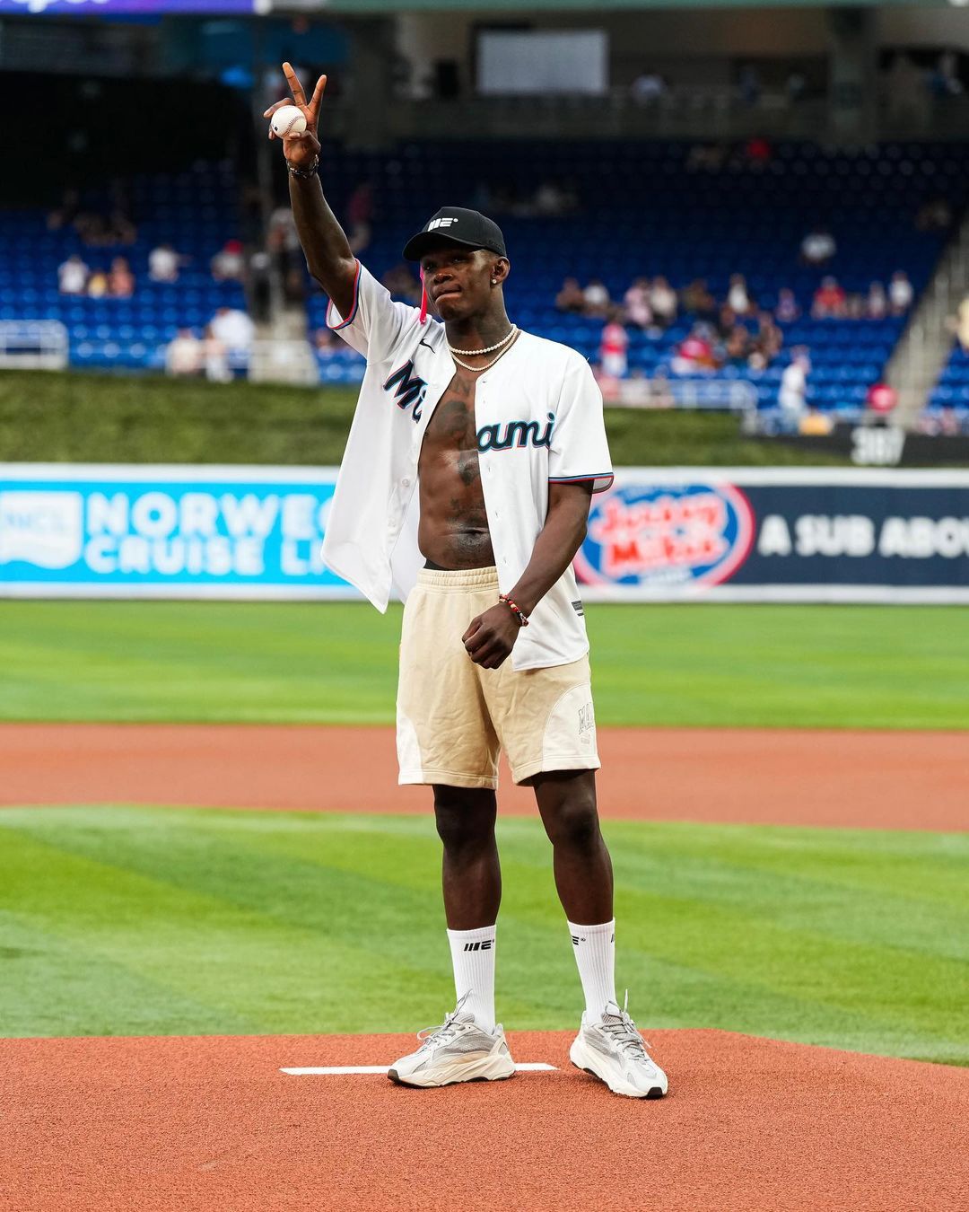 Israel Adesanya throws 1st pitch for the Miami Marlins - Pulse