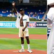 Ahead of the fight against Alex Pereira, Israel Adesanya arrives in Miami and throws the first pitch for the Marlins.