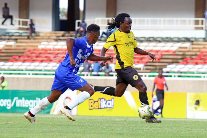 usker’s Jackson Macharia wheels away from AFC’s Washington Munene.