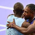 Letsile Tebogo and Noah Lyles after Olympic 200m final in Paris.