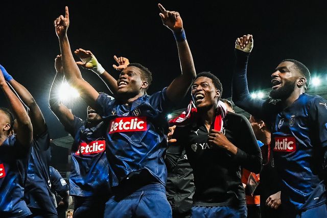 Hafiz Ibrahim celebrates the historic win with his Reims teammates. (Photo Credit: Reims/X)