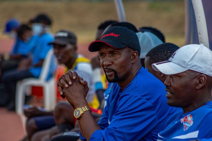 Ken Kenyatta and other members of Talanta's technical bench.
