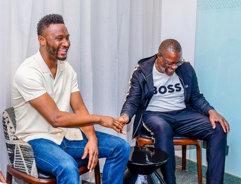 Mikel Obi with former ICT Minister Edwin Owalo. ©