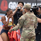 Melissa Jefferson-Wooden: Olympic medallist surprised by cousin serving in the US Army after becoming Grand Slam Track champion