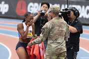 Melissa Jefferson-Wooden: Olympic medallist surprised by cousin serving in the US Army after becoming Grand Slam Track champion