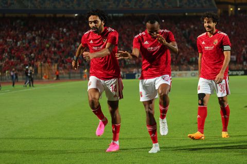 Hussein El Shahat of Al Ahly SC celebrate with Percy Tau
