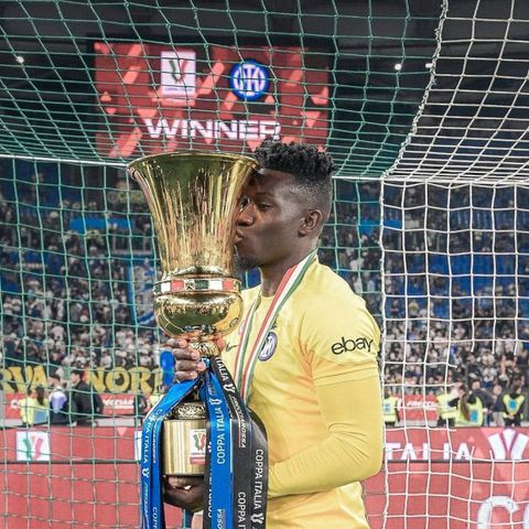 Andre Onana with the Super Copa Italia trophy at Inter Milan.