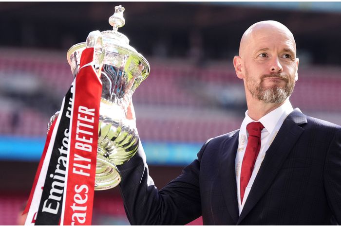 Erik Ten Hag with the Emirates FA Cup Manchester United won last season.