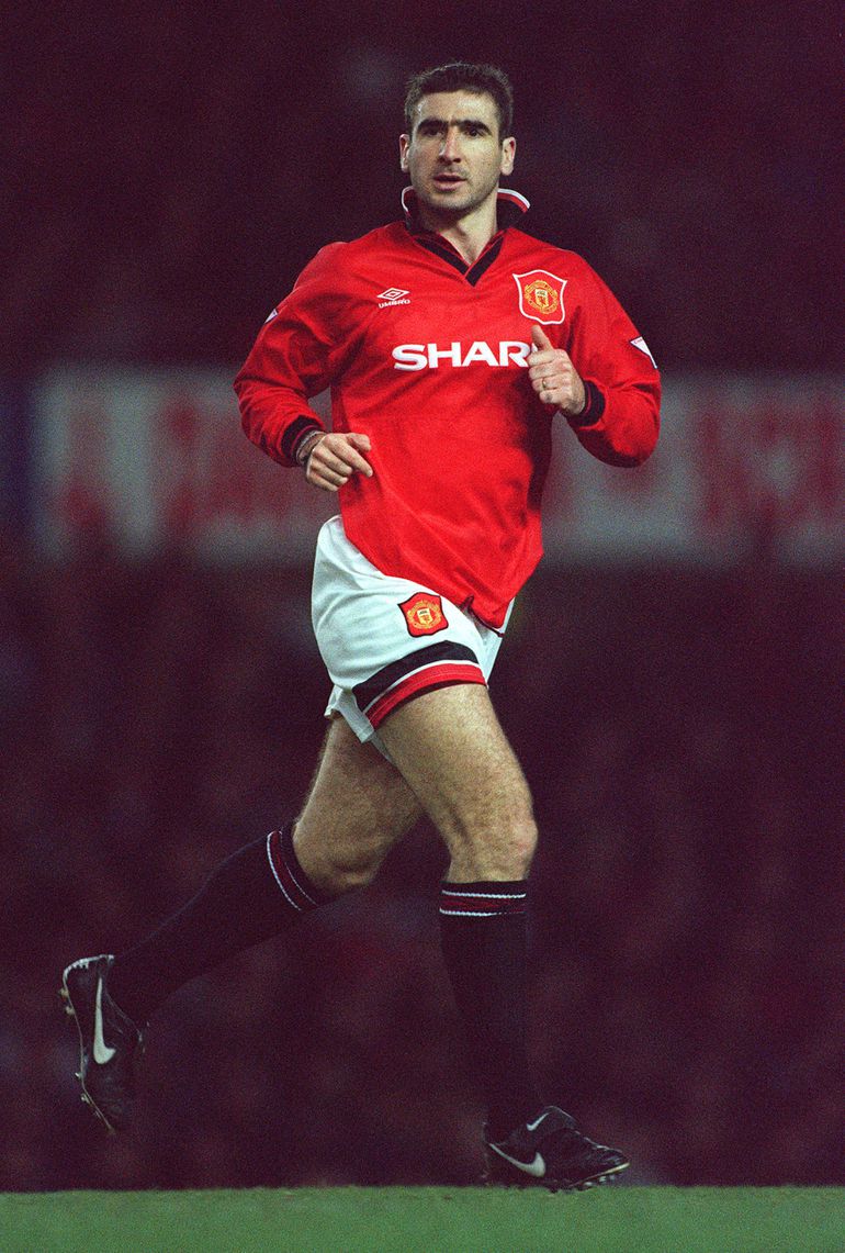 Eric Cantona in action for Manchester United