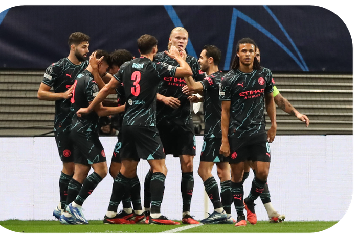 Manchester City players celebrating their win