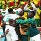 Senegal celebrating after becoming one of only two African nations to advance to the round of 16 of the World Cup in Qatar
