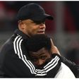 Vincent Kompany and Super Eagles' Nathan Tella embrace each other after the game.