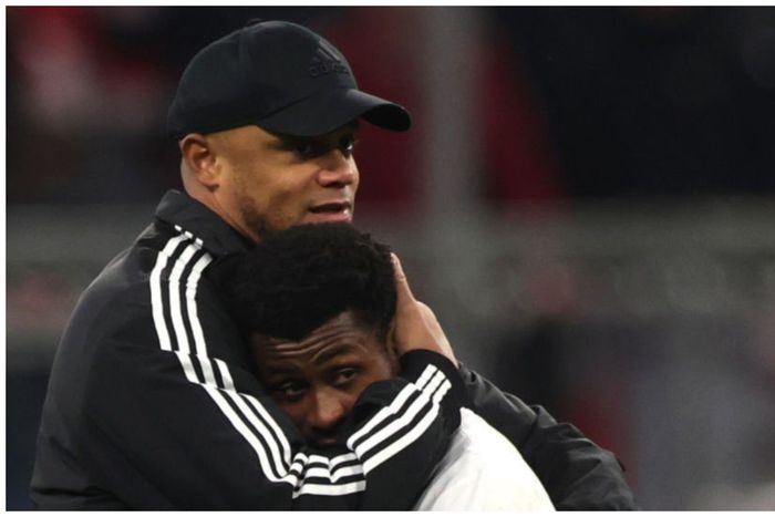 Vincent Kompany and Super Eagles' Nathan Tella embrace each other after the game.