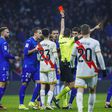 The referee shows Mason Greenwood a red card for dissent against Rayo Vallecano.