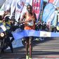 Victor Kipchirchir cuts the tape at the 2022 Eldoret City Marathon