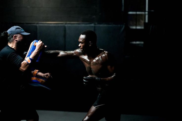 'Embrace the darkness' - Israel Adesanya talks tough ahead of a rematch against Alex Pereira.