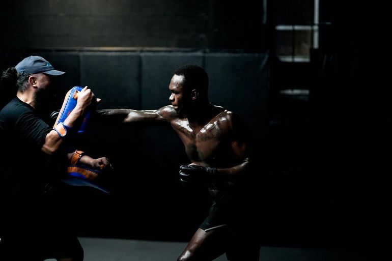 'Embrace the darkness' - Israel Adesanya talks tough ahead of a rematch against Alex Pereira.