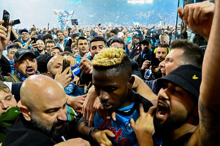 Osimhen celebrates with Napoli fans after Scudetto win