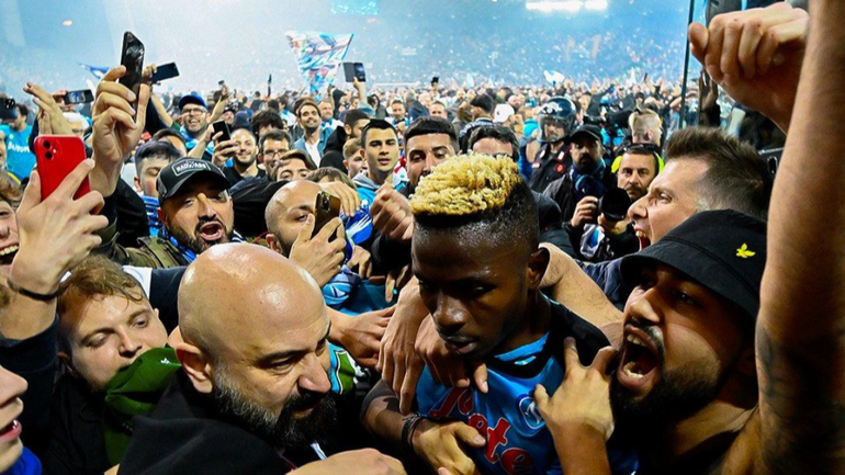 Osimhen celebrates with Napoli fans after Scudetto win