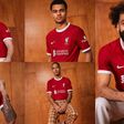 It is a classic style in vivid Liverpool red with a contrast white collar and cuffs that were inspired by Shankly's 1973–74 FA Cup–winning team.