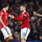 Harry Maguire and Luke Shaw in action for Manchester United