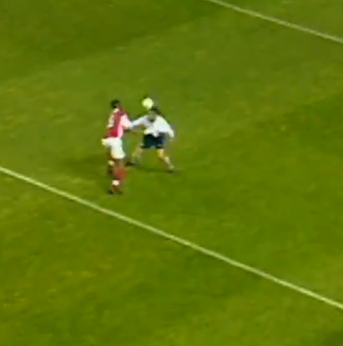 Kanu leaves his marker Young for dead.