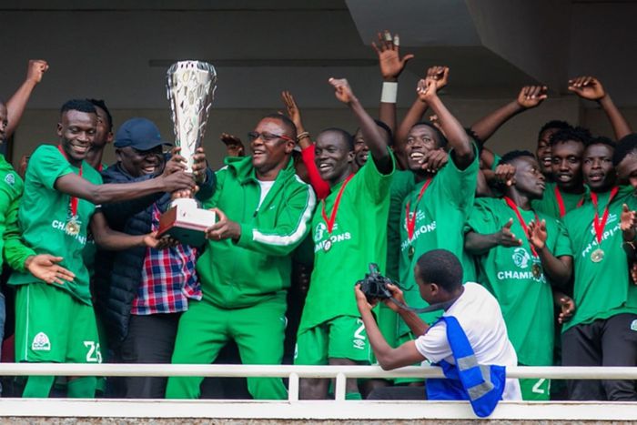 ICT CS Eliud Owala with Gor Mahia players when they won the league.