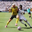 Julian Ryerson of Borussia Dortmund tussles with Vinicius Junior of Real Madrid during the Real Madrid vs Borussia Dortmund FIFA Club World Cup quarter final match at Metlife Stadium, New Jersey. Picture credit: David Klein Sportimage