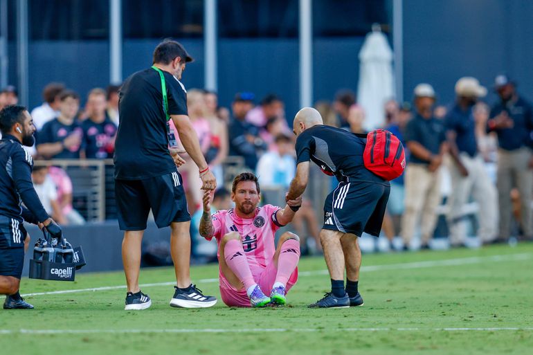 Inter Miami forward Lionel Messi (10) is helped to his feet after sustaining an injury in the first half during a Leagues Cup soccer match between Inter Miami CF and Necaxa (Photo by Chris Arjoon Icon Sportswire)