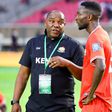 Harambee Stars coach Benni McCarthy with Collins Sichenje. Photo: FKF Media