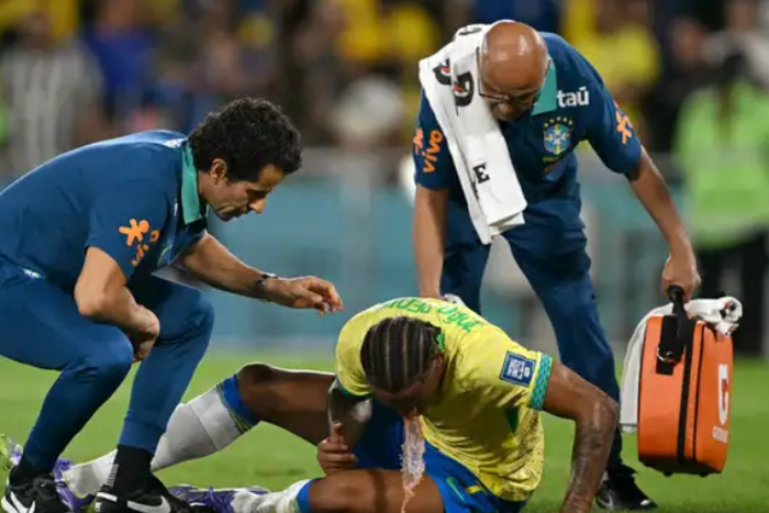 Joao Pedro vomits on the pitch against Chile || Image credit: Goal