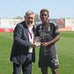Ucheibe posted receiving a plaque for achieving 100 appearances with Benfica. Instagram/Christy Ucheibe