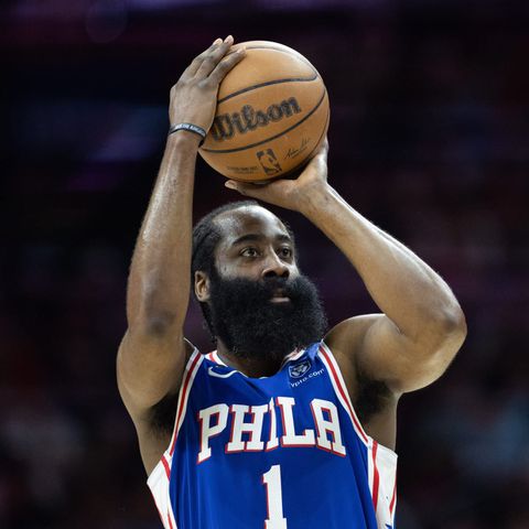 James Harden reports to Sixers training camp despite trade request