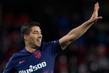 Suarez ends goal drought as Atletico sail into cup last 16