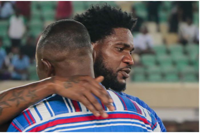 Brown Ideye and his manager Stanley Eguma moments after the match.