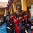 British boxer Dan Azeez brands Iyana Ipaja 'Ghetto', on a visit to Lagos, Nigeria.