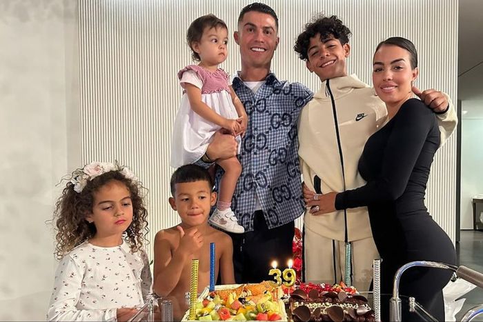 Cristiano Ronaldo's son is almost as tall as Al-Nassr forward as he shows off his birthday cake at 39.