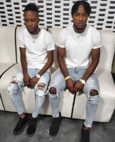 Kishane Thompson (R) with his brother Kishaun (L)