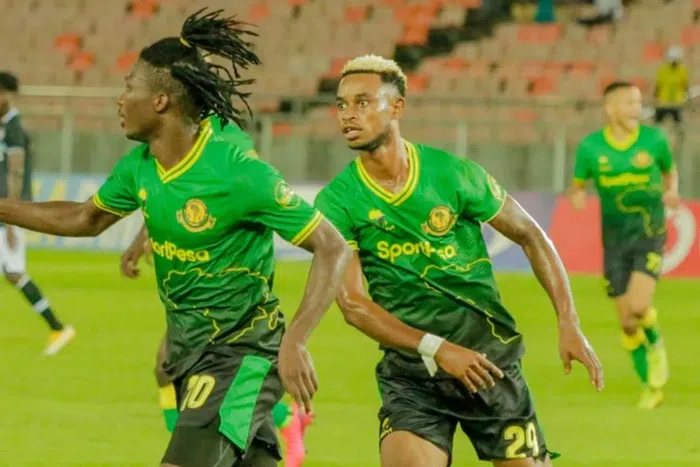 Yanga players celebrating a goal.