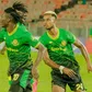 Yanga players celebrating a goal.