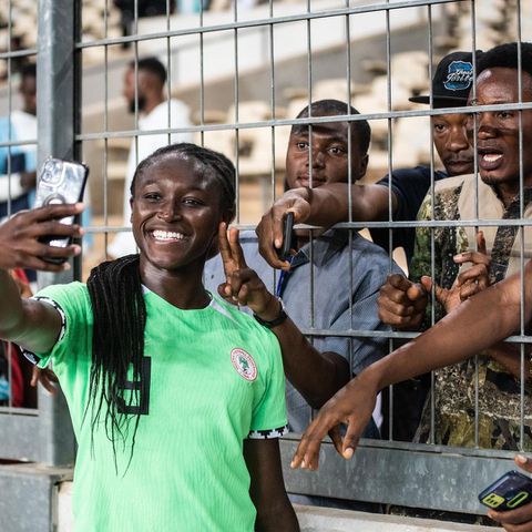 England-born star Rinsola Babajide celebrates Super Falcons of Nigeria victory against South Africa with fans.